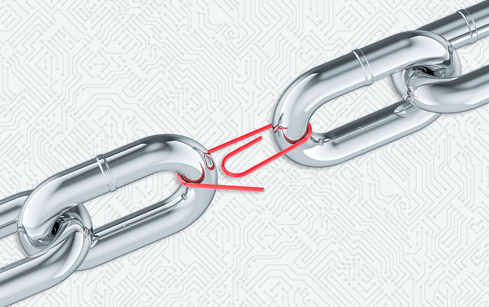 2 links of a chain held together by a paper clip. Weak link concept