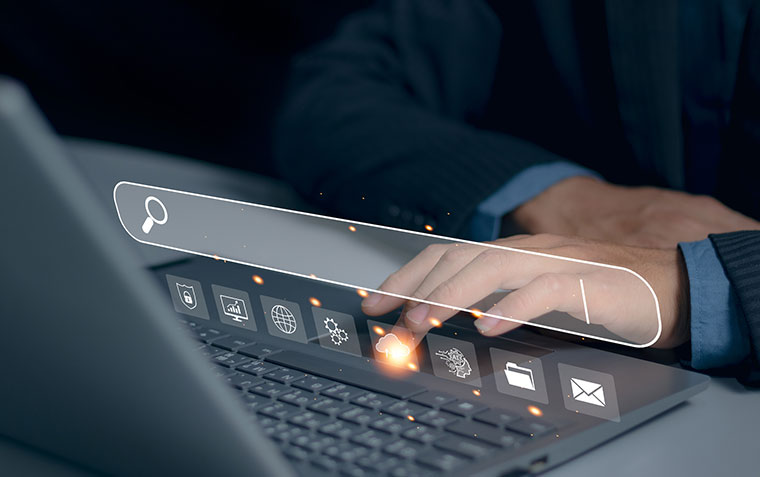 Businessman use laptop computer to Searching for information on virtual screen.