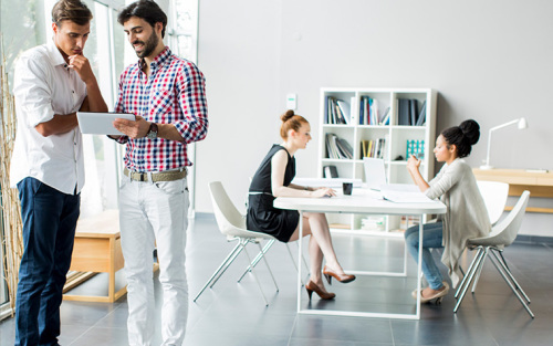 Office interior with 4 office staff